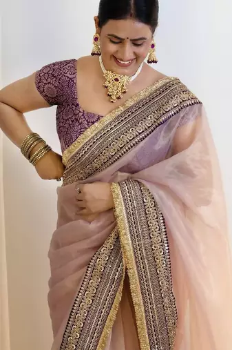 Purple embroidered blouse with embroidered saree