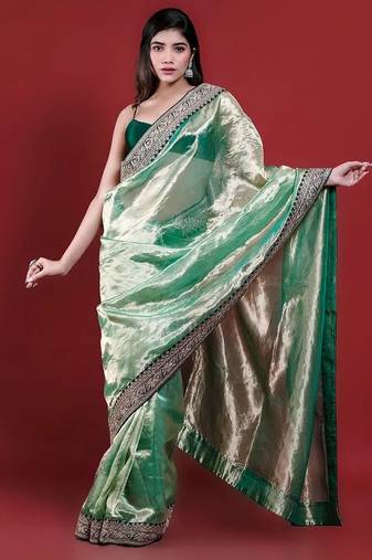Green embroidered blouse with embroidered saree