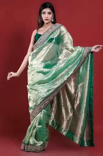 Green embroidered blouse with embroidered saree