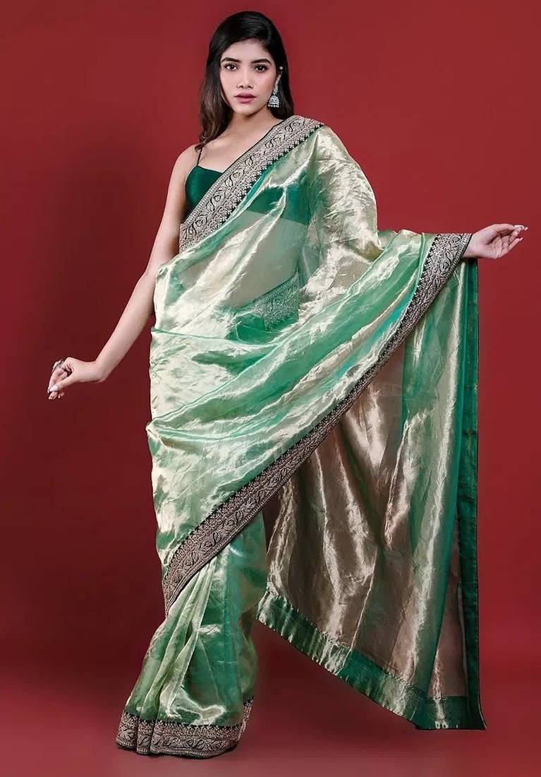 Green embroidered blouse with embroidered saree