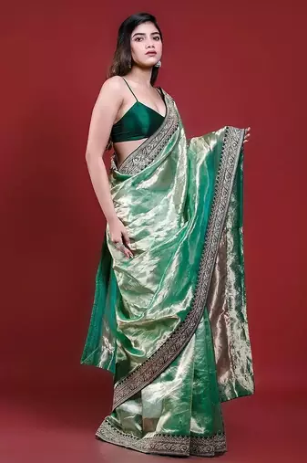 Green embroidered blouse with embroidered saree