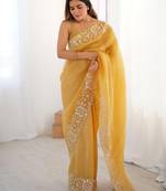 Yelllow embroidered blouse with embroidered saree