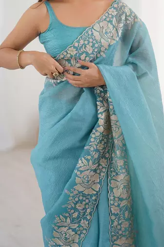 Blue embroidered blouse with embroidered saree