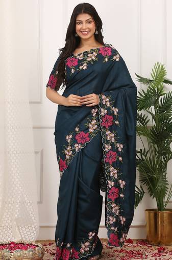 Teal embroidered blouse with embroidered saree