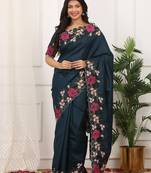 Teal embroidered blouse with embroidered saree
