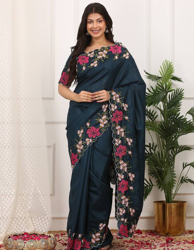 Teal embroidered blouse with embroidered saree
