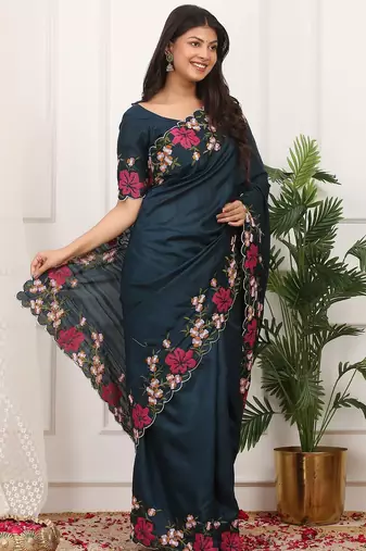 Teal embroidered blouse with embroidered saree