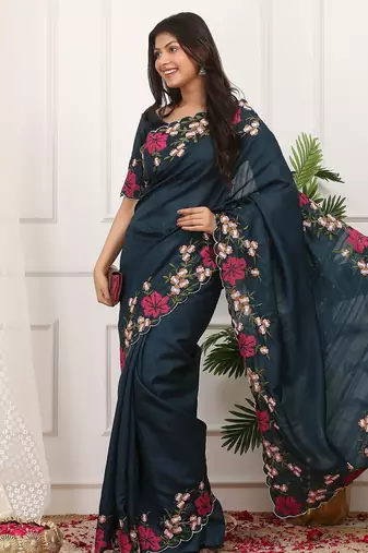 Teal embroidered blouse with embroidered saree