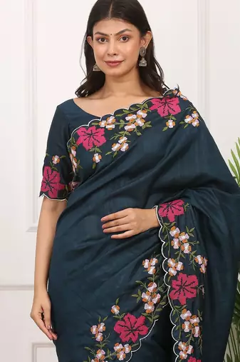 Teal embroidered blouse with embroidered saree