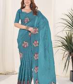 Teal embroidered blouse with embroidered saree