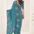 Teal embroidered blouse with embroidered saree