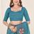 Teal embroidered blouse with embroidered saree