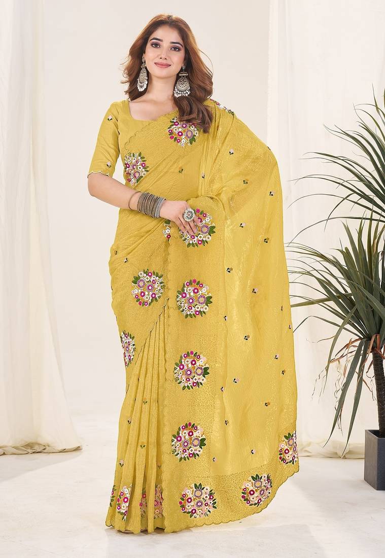 Yellow embroidered blouse with embroidered saree