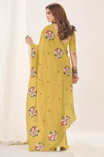Yellow embroidered blouse with embroidered saree