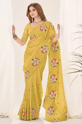 Yellow embroidered blouse with embroidered saree
