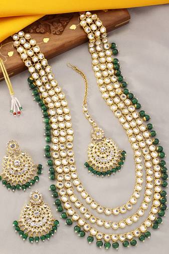 Aheli brass and kundan long necklace with maang tikka & earrings set