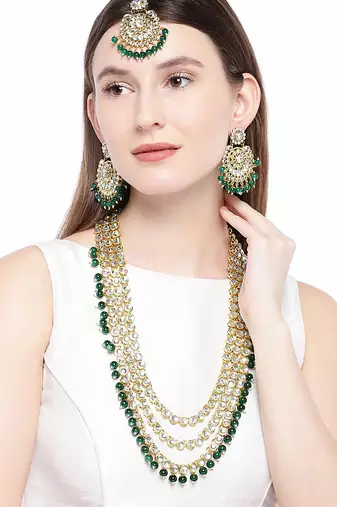 Aheli brass and kundan long necklace with maang tikka & earrings set