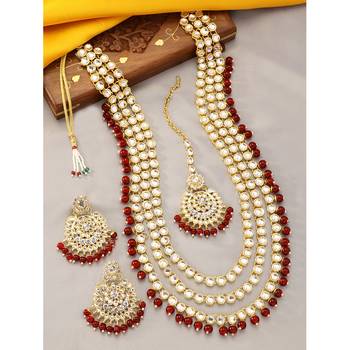 Aheli gold-plated brass and kundan necklace with mang tika & earrings jewellery set 1