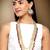 Aheli gold-plated brass and kundan necklace with mang tika & earrings jewellery set