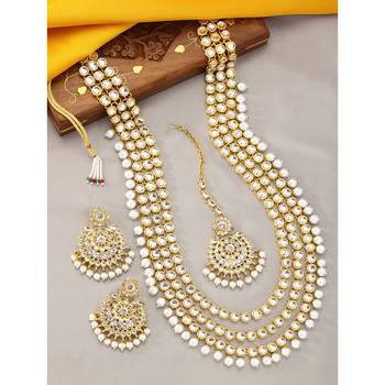 Aheli gold-plated brass and kundan necklace with mangtika & earrings set 1