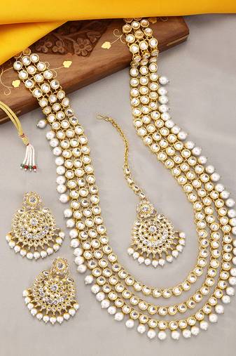 Aheli gold-plated brass and kundan necklace with mangtika & earrings set
