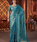Teal embellished saree with embellished blouse