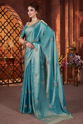 Teal embellished saree with embellished blouse