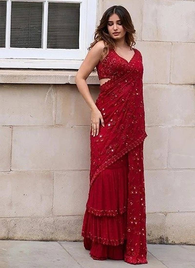 Red bloue piece with embroidred saree