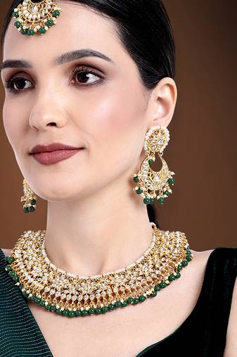Aheli green kundan choker necklace earrings with maang tikka jewellery set