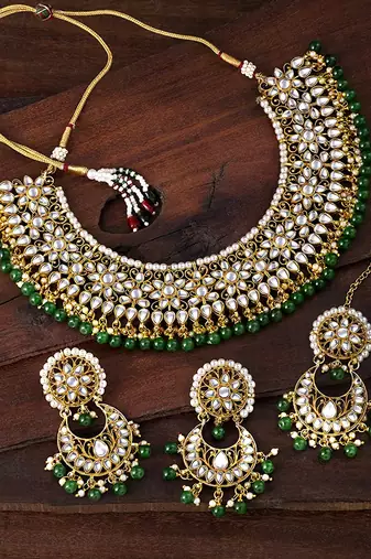 Aheli green kundan choker necklace earrings with maang tikka jewellery set