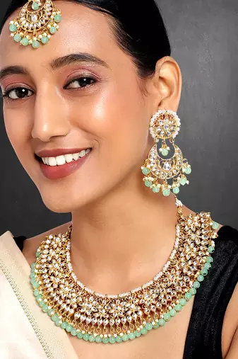 Aheli mint kundan choker necklace earrings with maang tikka jewellery set