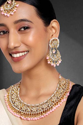 Aheli pink kundan choker necklace earrings with maang tikka jewellery set