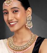 Aheli pink kundan choker necklace earrings with maang tikka jewellery set