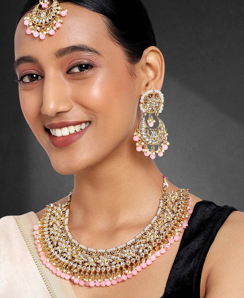 Aheli pink kundan choker necklace earrings with maang tikka jewellery set
