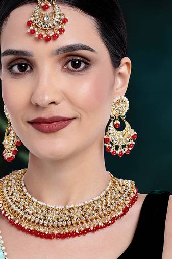 Aheli red kundan choker necklace earrings with maang tikka jewellery set