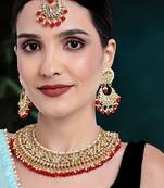 Aheli red kundan choker necklace earrings with maang tikka jewellery set