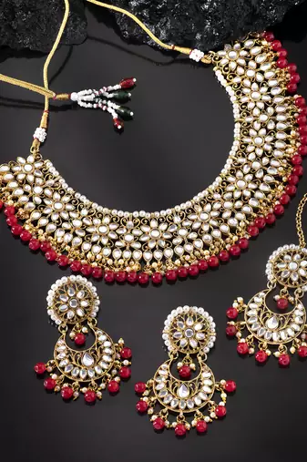Aheli red kundan choker necklace earrings with maang tikka jewellery set