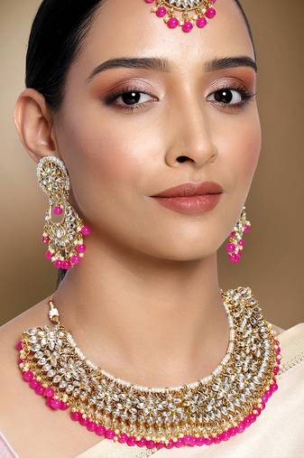 Aheli rani pink kundan choker necklace earrings with maang tikka jewellery set