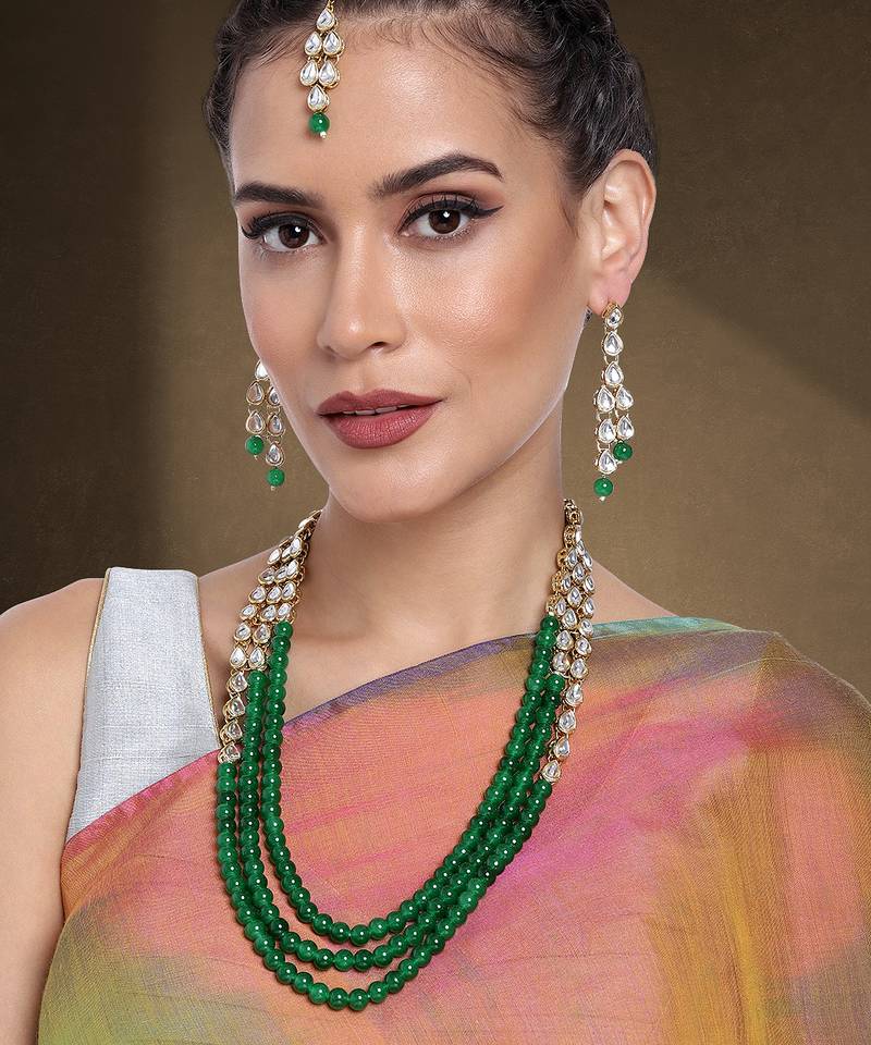 Aheli green traditional jewellery kundan pearl layered necklace earring maang tika set   fancy