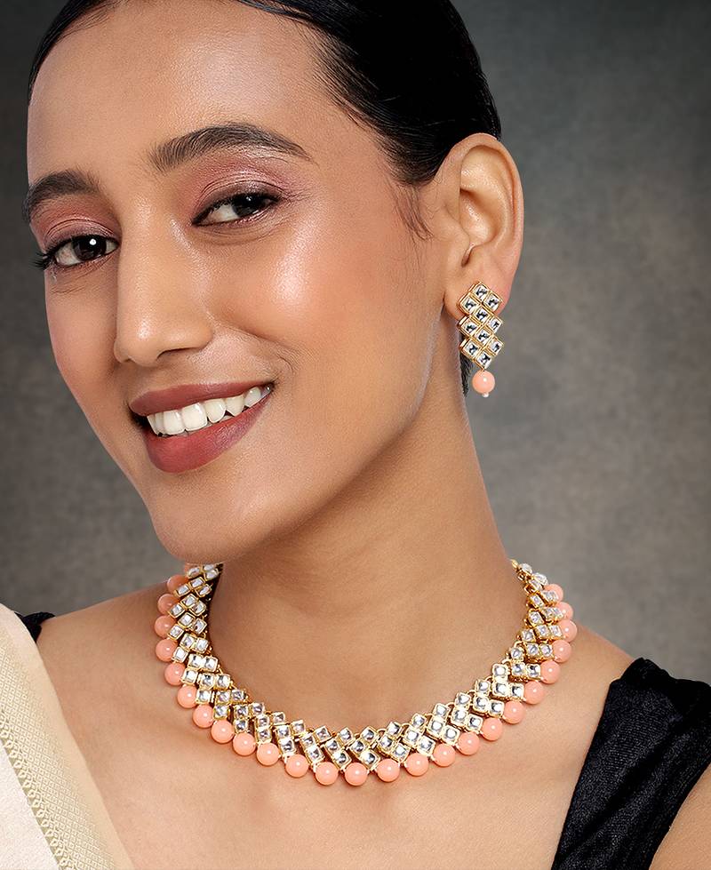 Aheli peach ethnic kundan pearl fancy bridal traditional choker necklace jewellery set with earrings