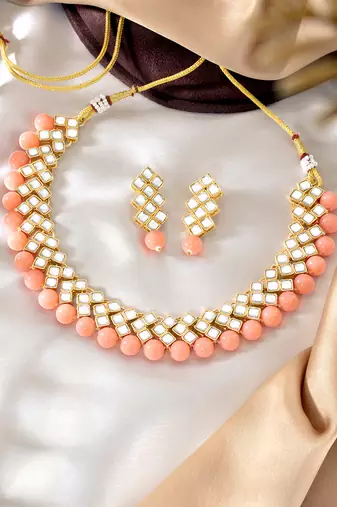 Aheli peach ethnic kundan pearl fancy bridal traditional choker necklace jewellery set with earrings