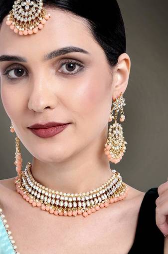 Aheli peach kundan pearl choker necklace earring maang tikka traditional jewellery set for women