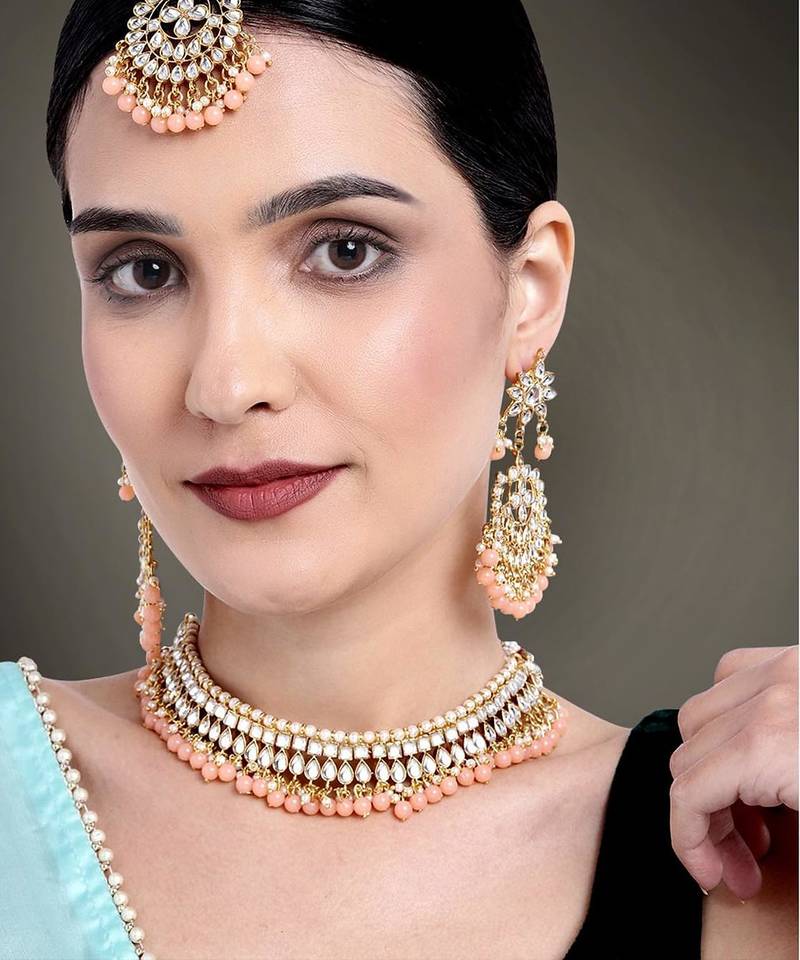 Aheli peach kundan pearl choker necklace earring maang tikka traditional jewellery set for women