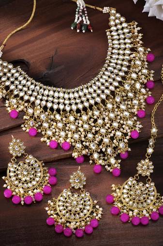 Aheli traditional kundan & pearl drop rani pink choker necklace earring set with maang tikka for women