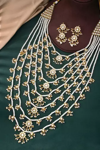 Aheli traditional white floral multi layered necklace earrings jewellery set for women