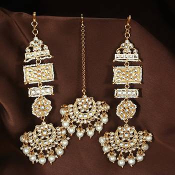 Aheli long traditional kundan faux pearl chandbali earrings with maang tikka set for women 1