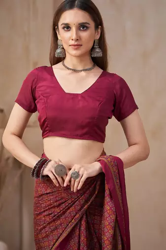 Plum printed crepe silk fancy smooth saree with unstitch blouse