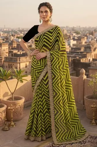 Mahendi printed embriodered lace bollywood saree with blouse piece.