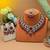 Maroon color kundan necklace set