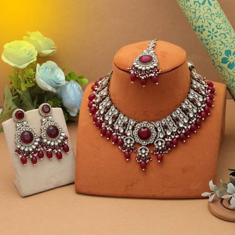 Maroon color kundan necklace set